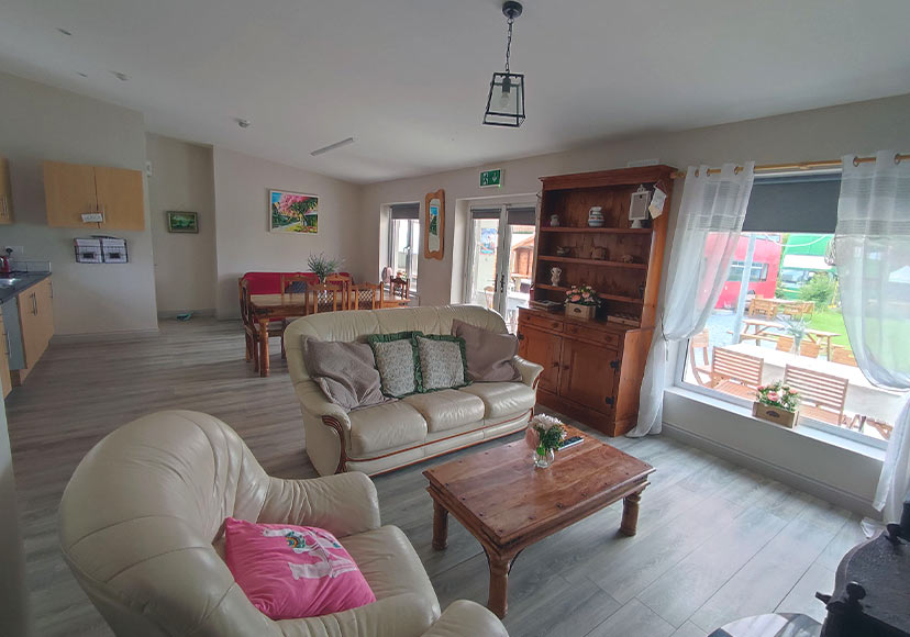 Living room and kitchen at Glasson Glamping Farm.