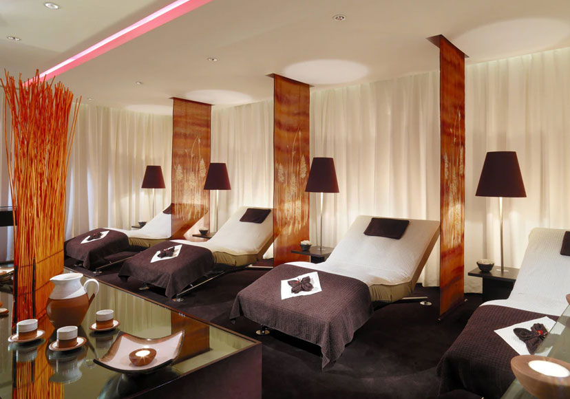 Row of spa beds at Sirana Spa.